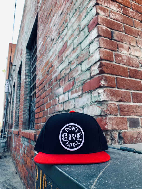Don't give up black and red snapback